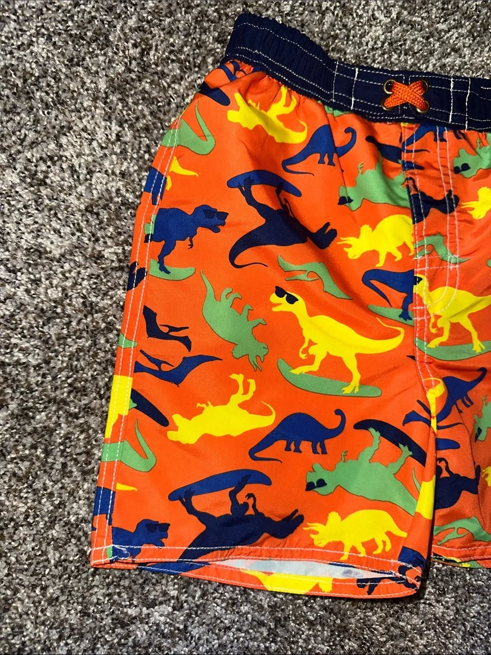 Bright Orange Dino Swim Trunks for Kids with Navy Waistband